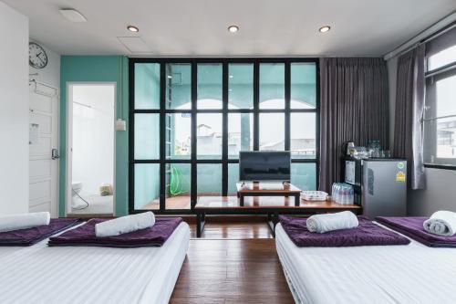 99 Hostel Room Type - Quadruple Room with Balcony