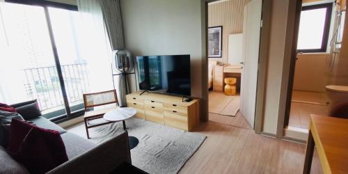 Asok - Din Daeng Apartment - Tap to explore photos