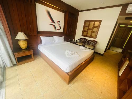 Talya Patong Hotel - Tap to explore photos