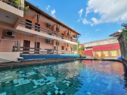 Baan Veerakit Hotel - Tap to explore photos