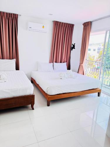 Joyera Kata Beach Hotel - Tap to explore photos