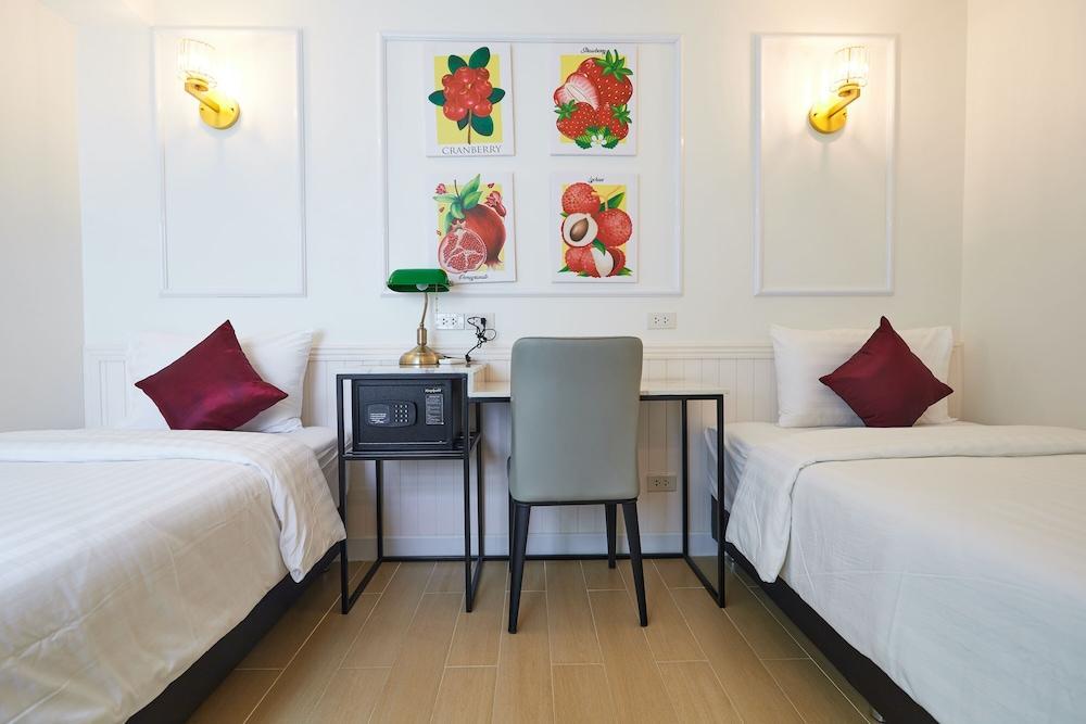 Rose Apple Hotel - Tap to explore photos