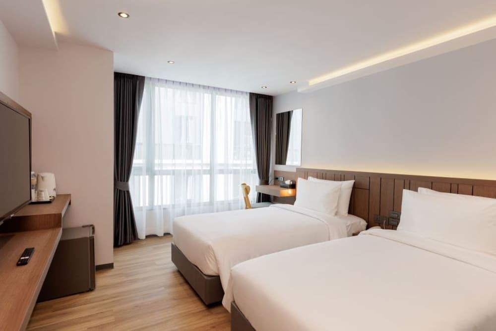 Pure Eleven Hotel Bangkok - Tap to explore photos