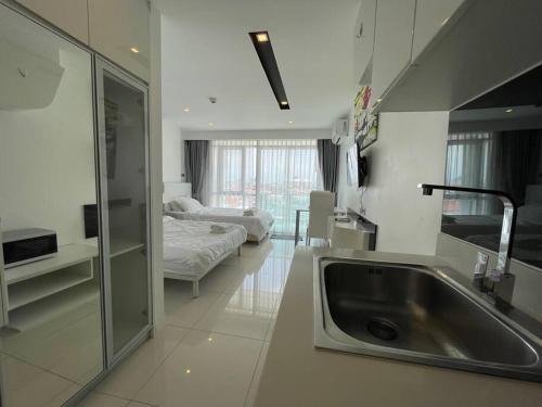 GETAWAY STUDIO in City Center Residence - Tap to explore photos