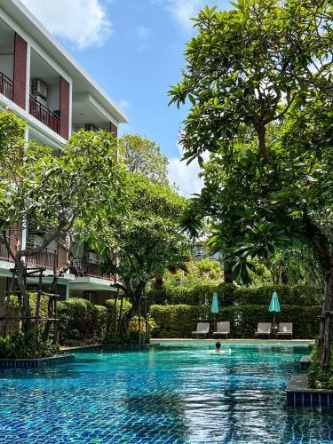 The Title Rawai: Beachfront condotel - Tap to explore photos