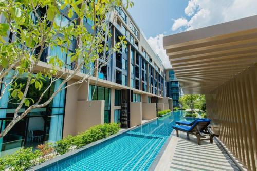The Aristo by Holy Cow, 2-BR, 60 m2, pool view - Tap to explore photos