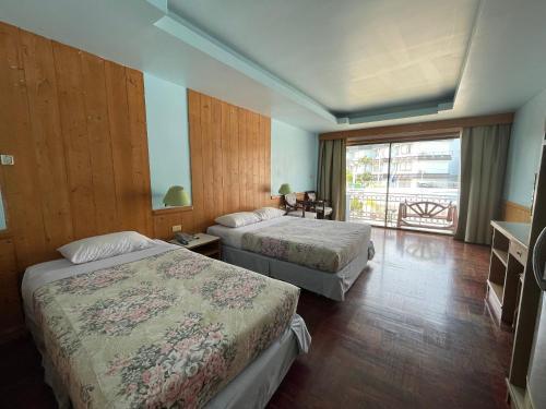 Silversand Villa Hotel - Tap to explore photos