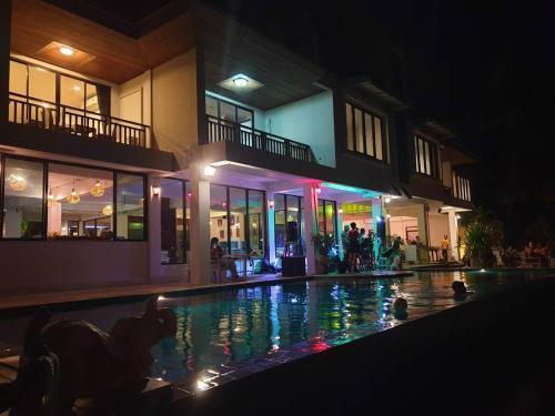 Baan Ampai Beach Hotel - Tap to explore photos