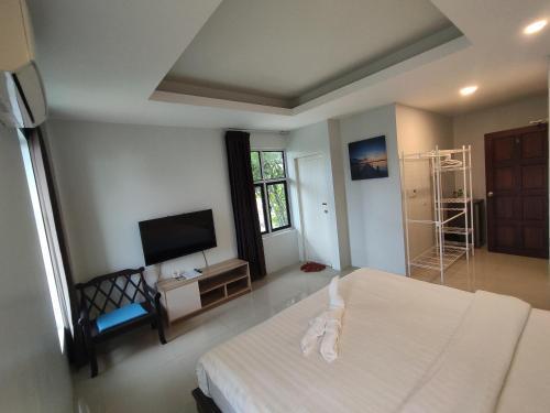 Baan Ampai Beach Hotel - Tap to explore photos