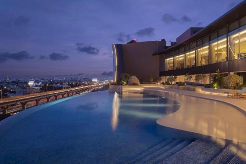 Asawin Grand Convention Hotel - Tap to explore photos