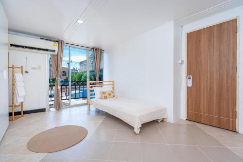 Kata Station Boutique Hotel, Kata Beach - Tap to explore photos