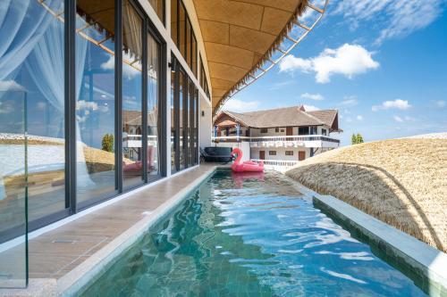 Three Monkeys Villas - Tap to explore photos