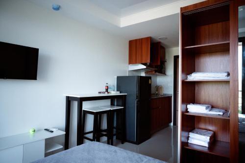 777 Beach Condo Phuket - Tap to explore photos