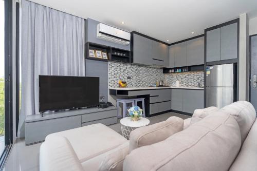 Citygate 1BR Apartment L609, Several Pools, Gym & Rooftop - Tap to explore photos