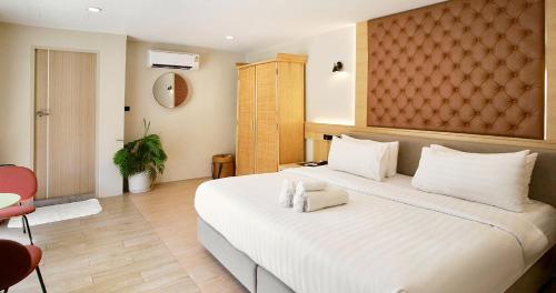 Heaven Boutique Hotel - Tap to explore photos