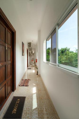 Passion Nai Harn Guesthouse - Tap to explore photos