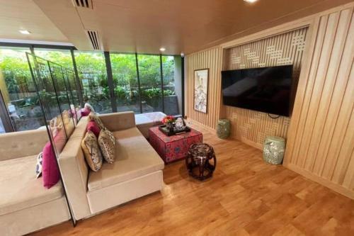 The Base Central - Luxury Resort-Style Comfort - Tap to explore photos
