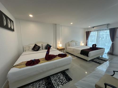 Inn Dulgence Room Type - Deluxe Double Room with Extra Bed