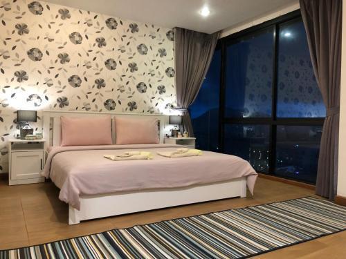 WOW Apartment at Unity Patong - Tap to explore photos