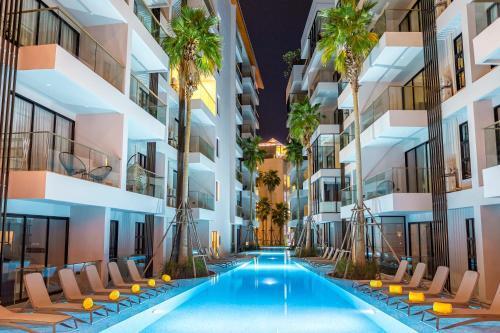 Surin Beach Residence - Tap to explore photos