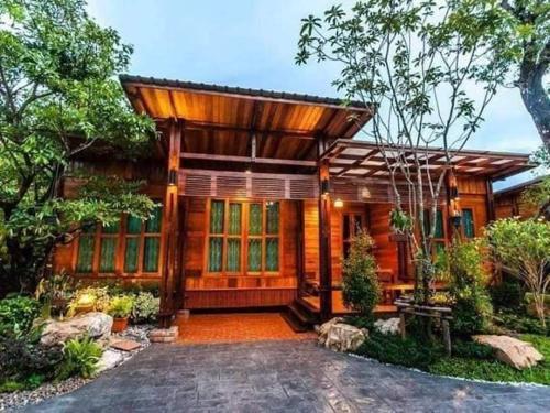 Areeya phubeach resort wooden house Coliving Coworking - Tap to explore photos