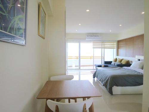 Sunshine Beach Condotel by Lux - Tap to explore photos