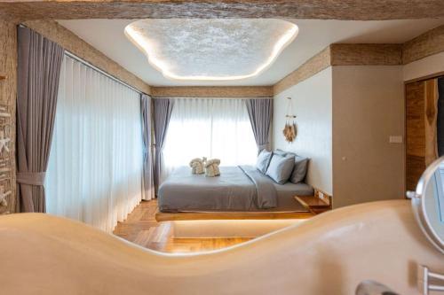 The Rock Samui Beachfront Resort - Sha Plus Hotel - Tap to explore photos