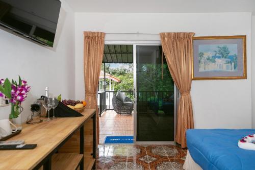 Oceanview Bungalows by EAT, Karon Beach - Tap to explore photos