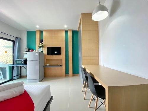 Chalong - Studio Service Apartment - Phoomjai - Tap to explore photos
