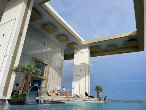 Copacabana Pattaya high floor - Tap to explore photos