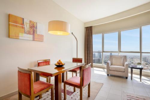 Grand Millennium Al Wahda Executive Apartments - Tap to explore photos