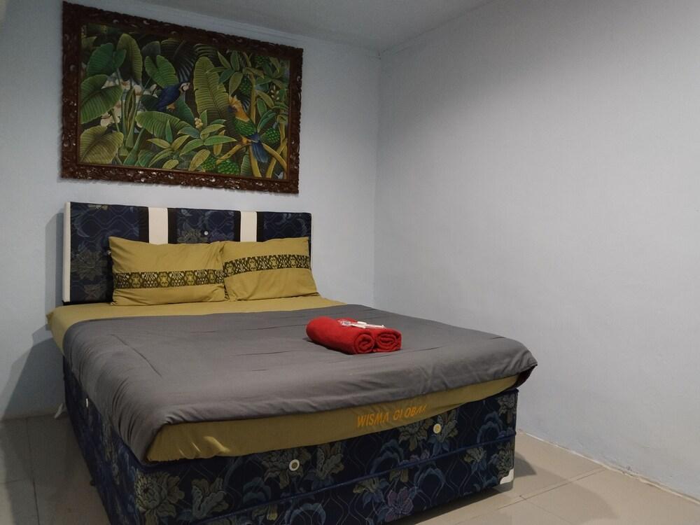 Hotel Global Syariah - Tap to explore photos