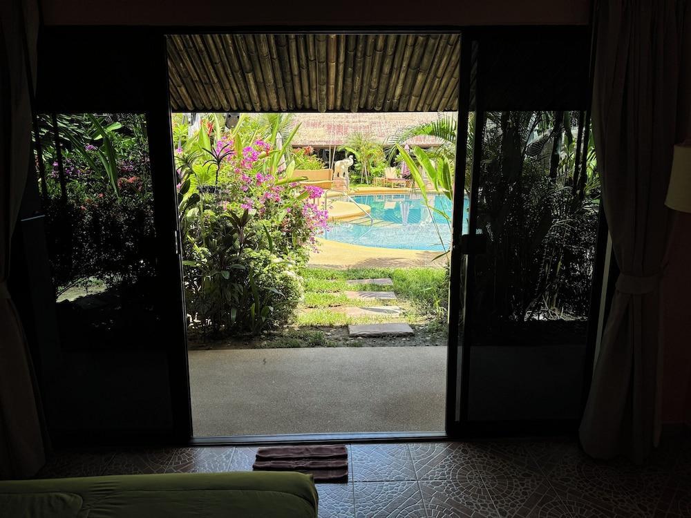 Tropical Garden Kamala Resort - Tap to explore photos