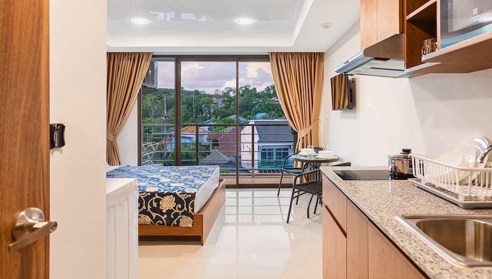 Rawai Beach Condo Room 318 - Tap to explore photos