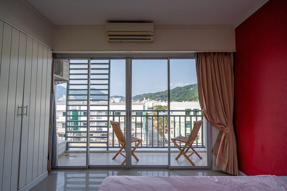 Santi White House Patong Hotel - Tap to explore photos