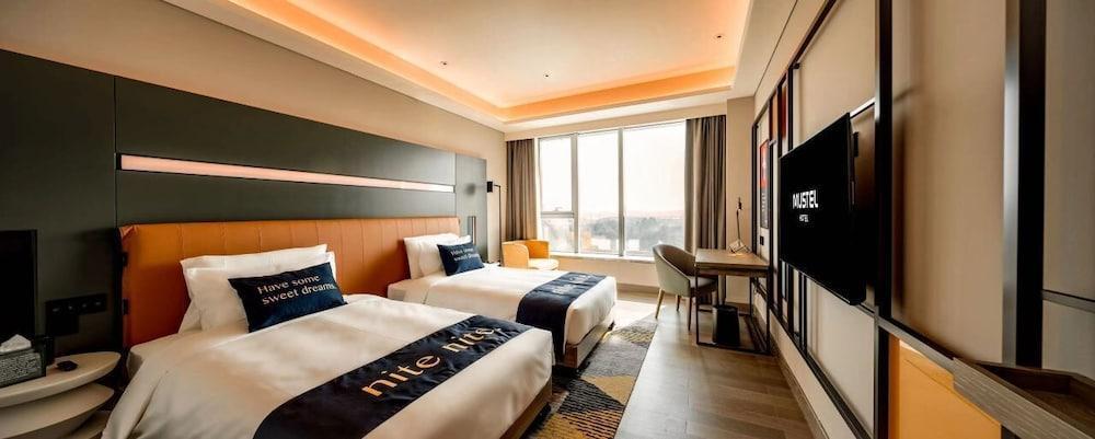 Guangzhou Muwenti Hotel Management Co., Ltd Room Type - Executive Twin Room