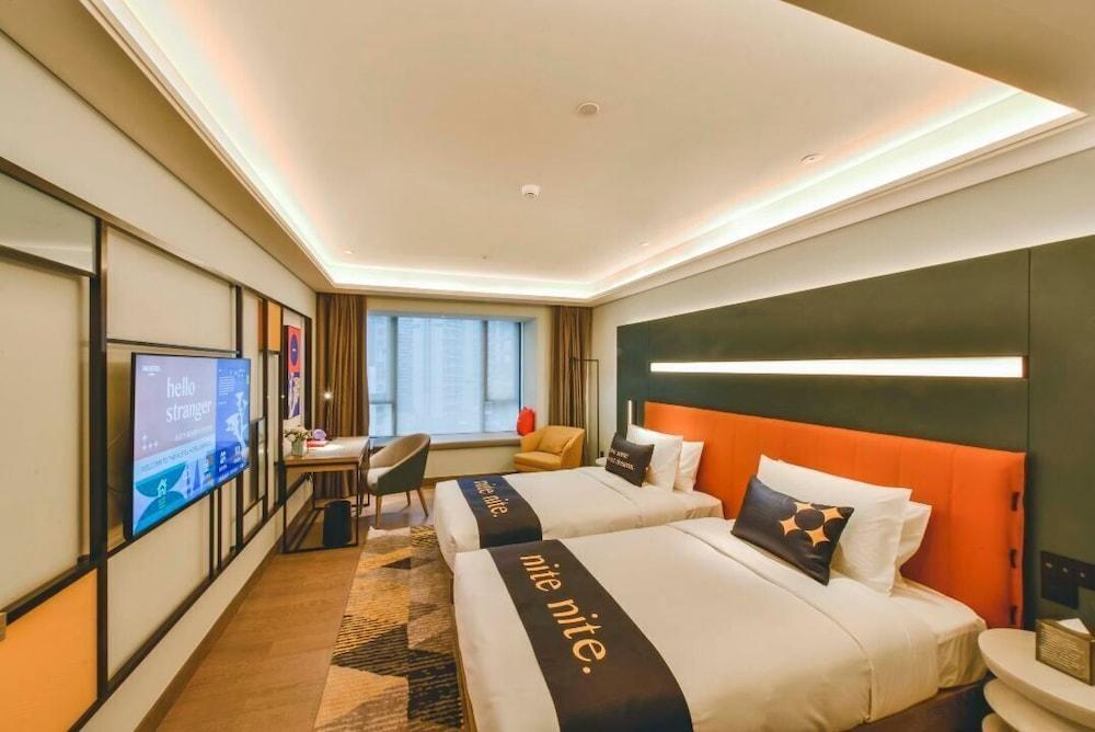 Guangzhou Muwenti Hotel Management Co., Ltd Room Type - Superior Twin Room
