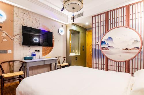 Puzzle Hotel - Zhongshan 8th Road Chenjiaci Subway Station Branch - Tap to explore photos