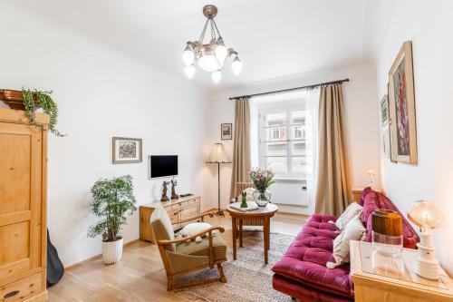 Charming Apartment in Lesser Town - Tap to explore photos