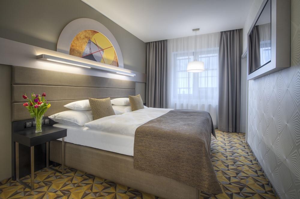 Hotel Essence - Tap to explore photos