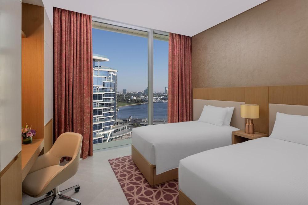 Hilton Dubai Creek Hotel & Residences - Tap to explore photos