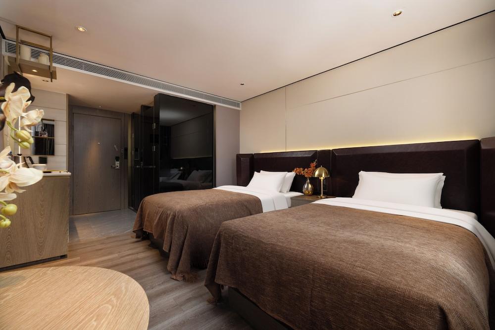 Housekeeper Hotel Beijing Road Branch - Tap to explore photos