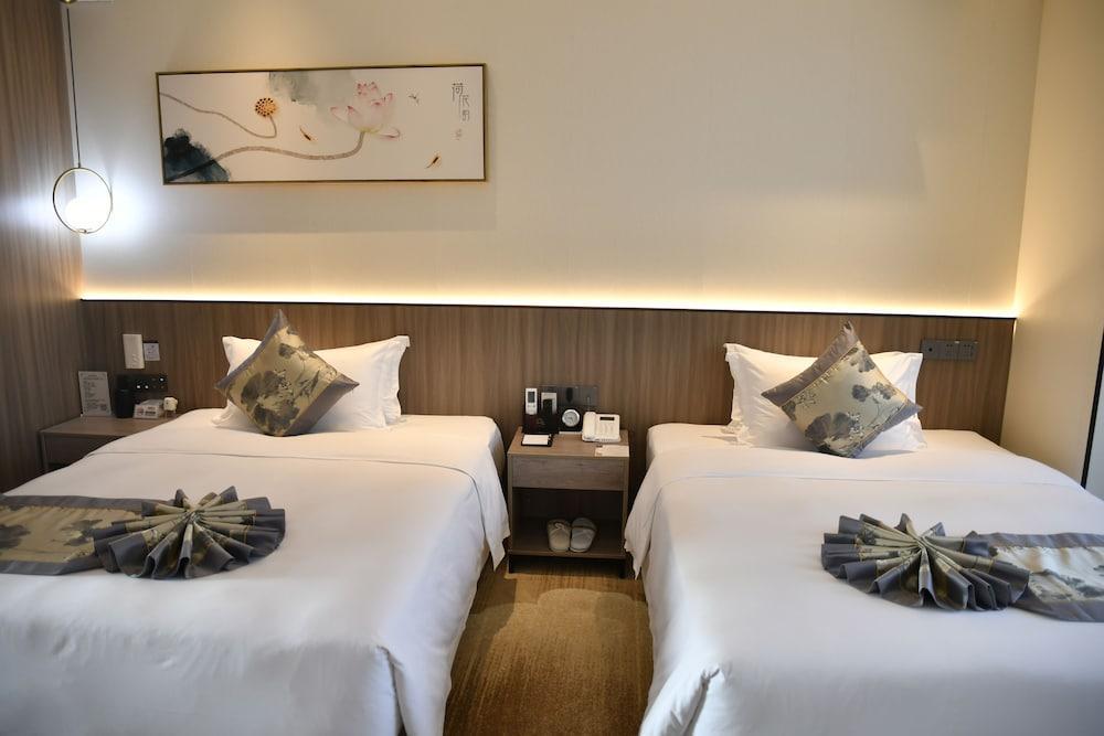 Qiling LN Dongfang Hotel - Tap to explore photos