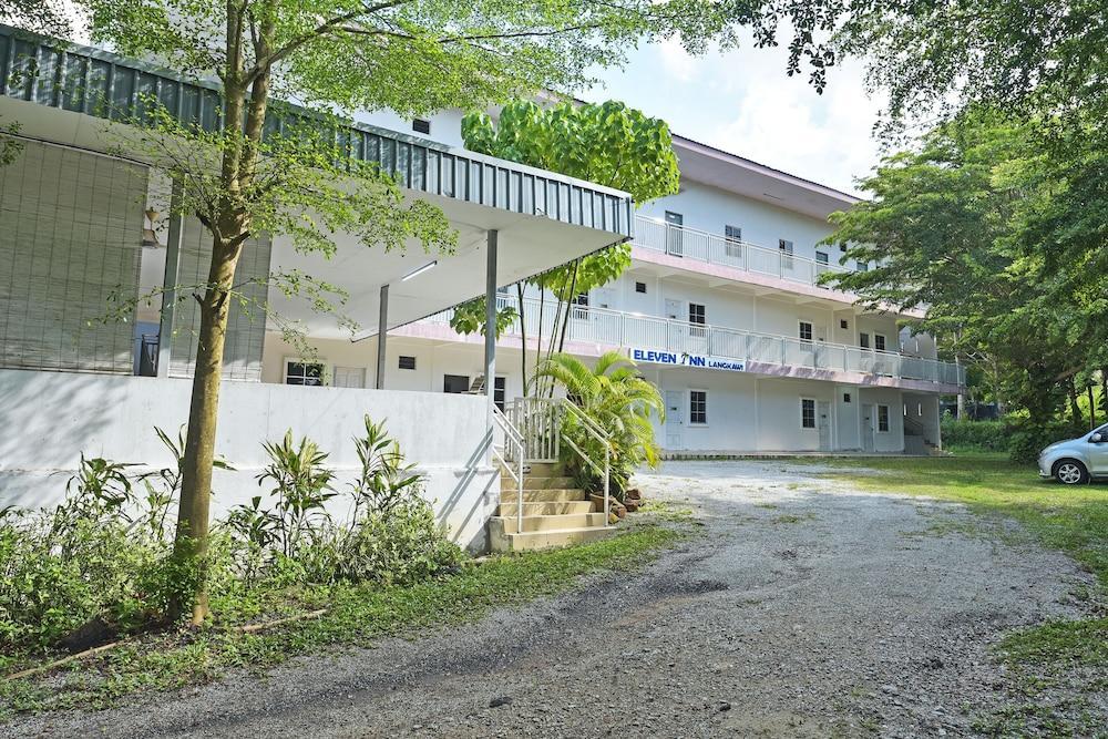 OYO 90879 Eleven Inn - Tap to explore photos