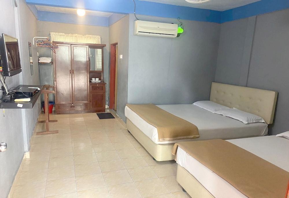 Hotel O Homestay D Lalang Inn - Tap to explore photos