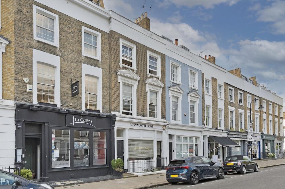 Stylish Lower Ground Studio in Fashionable Primrose Hill - Tap to explore photos