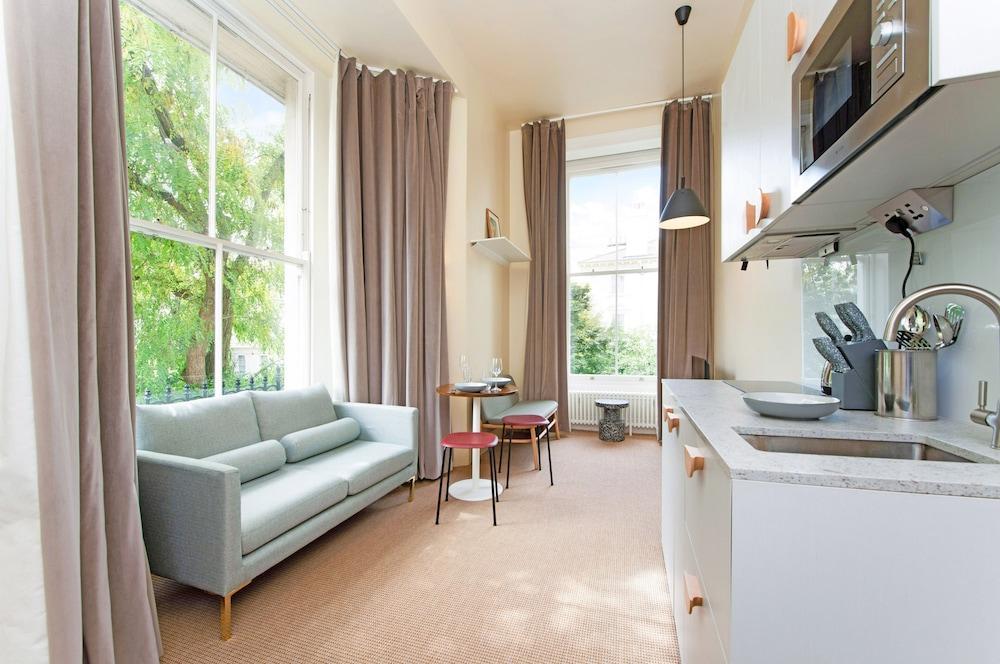 Grand Studio Suite in Historic Camden Terrace - Tap to explore photos