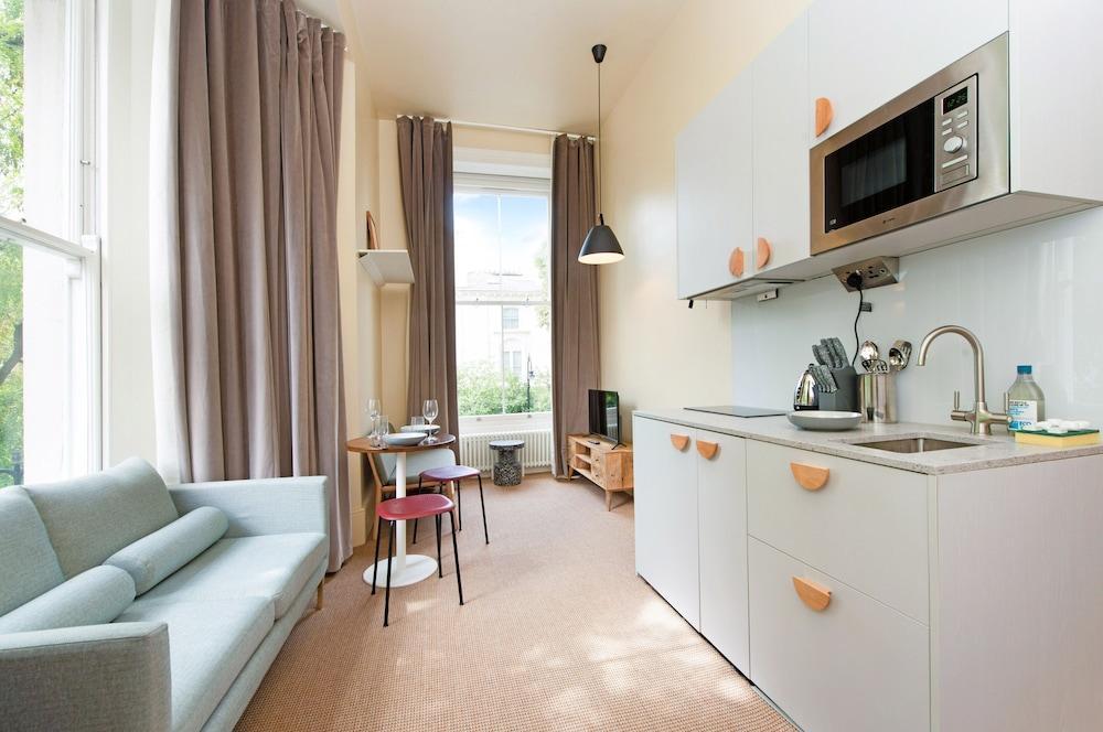 Grand Studio Suite in Historic Camden Terrace - Tap to explore photos