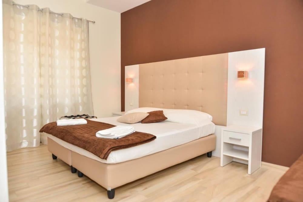 Your Rhome Experience Rome in a Bright and Welcoming Space - Tap to explore photos