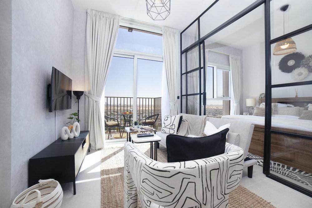 Modern Boho 1BR Sleeps4 Balcony Pool Gym Dxbhills - Tap to explore photos